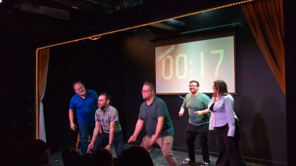 Minor Adjustments improv group performing to an audience