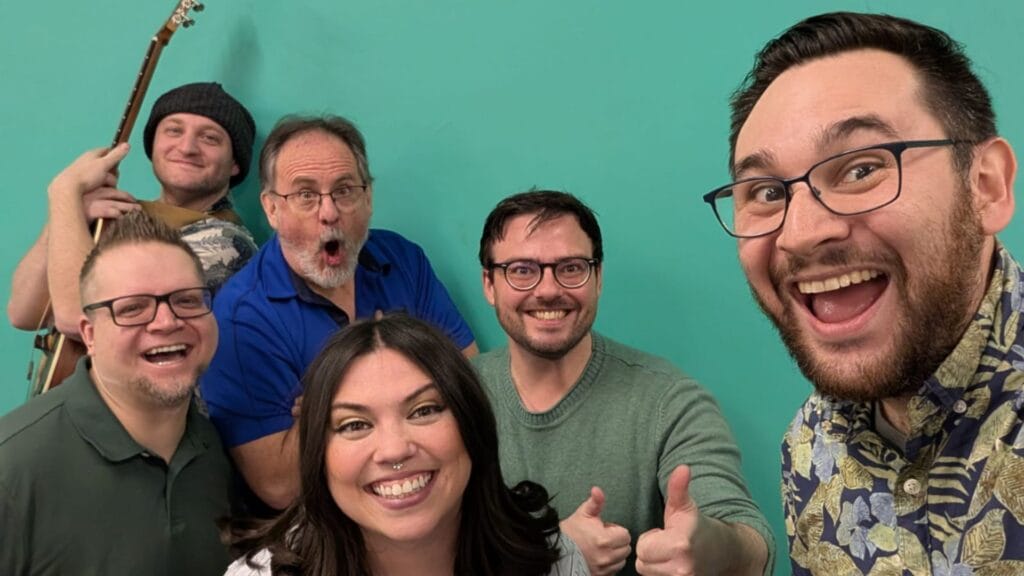 Minor Adjustments improv group posing for a selfie